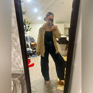 Tan saude jacket thrirted dry cleaned and never worn